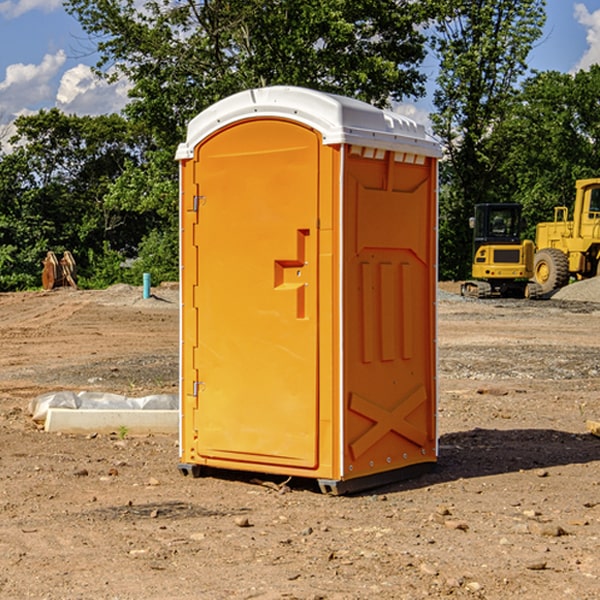 what is the cost difference between standard and deluxe portable restroom rentals in Rainbow